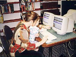 Anna-Marie and Alice check out their photos on the new Books for Babies web pages.