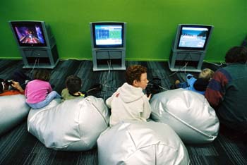 Kids playing Xbox and Playstation