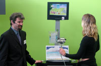 Dr Mark Billinghurst, Director of the Hit Lab NZ, and Claudia Nelles demonstrate eyeMagic