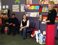 Jane Spears, the Library's Lifelong Learning Manager, congratulates the Grand Prize winners.