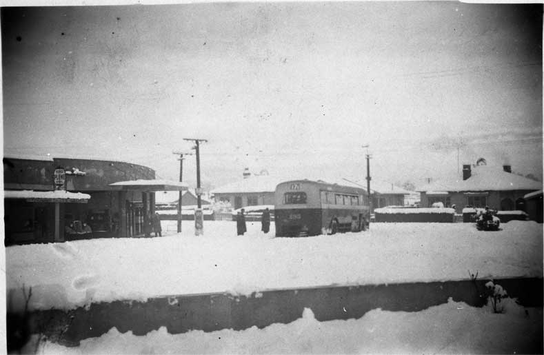 Outside the Bryndwr Service Station, corner of Normans and Strowan Roads, Bryndwr Outside the Bryndwr Service Station, corner of Normans and Strowan Roads, Bryndwr