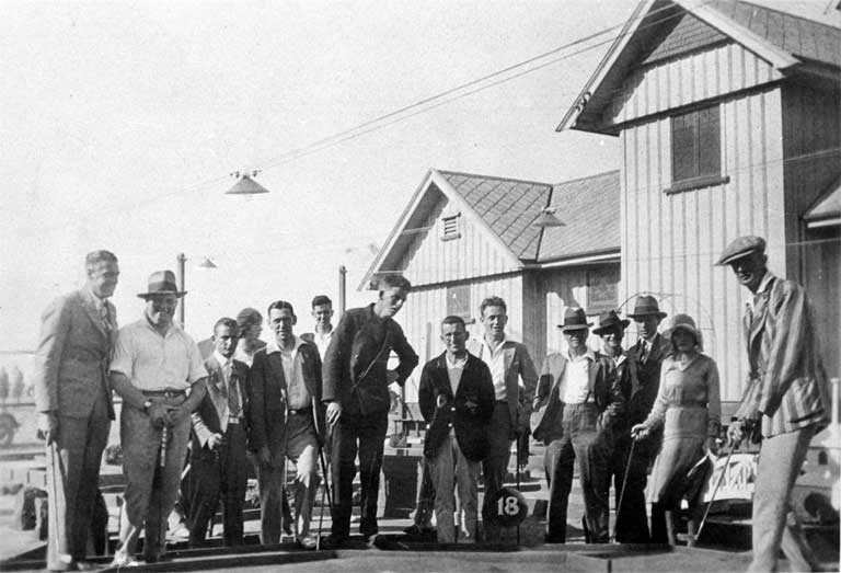 Playing mini-golf in front of the old Central Brighton Surf Club Playing mini-golf in front of the old Central Brighton Surf Club