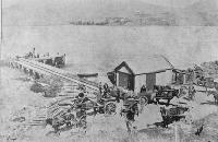 The wharf, Port Levy, at grass-seeding time