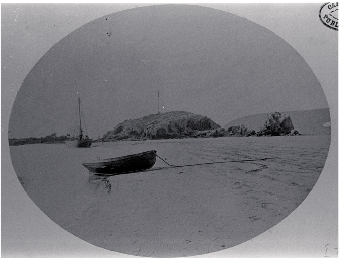Small boat and dinghy beached near Cave Rock, Sumner, Christchurch Small boat and dinghy beached near Cave Rock, Sumner, Christchurch