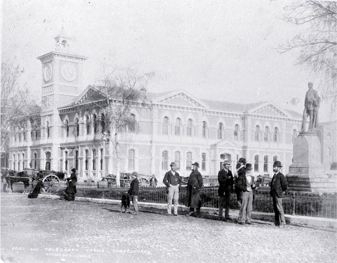 Cathedral Square, showing the Post Office and Godley statue, with delivery carts and pedestrians Cathedral Square, showing the Post Office and Godley statue, with delivery carts and pedestrians