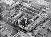 Aerial view of the gutted shell of the three-storied department building