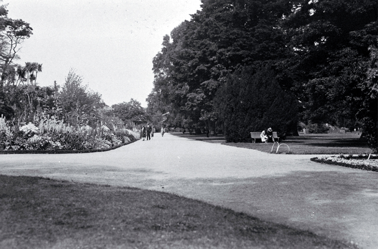 People strolling along the lane that leads from the Robert McDougall Art Gallery in the Christchurch Botanic Gardens People strolling along the lane that leads from the Robert McDougall Art Gallery in the Christchurch Botanic Gardens