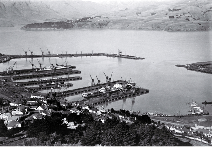 Ships berthed at Lyttelton Harbour : Diamond Harbour can be seen in the distance. Ships berthed at Lyttelton Harbour : Diamond Harbour can be seen in the distance.