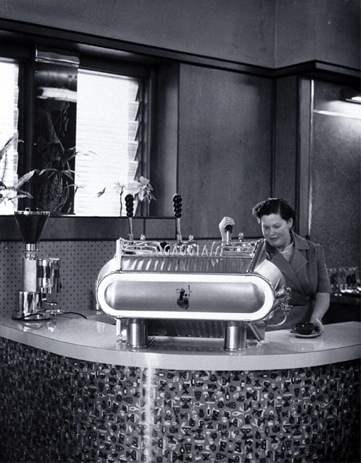 Woman serving expresso coffee at Fails Cafe, 82 Cashel Street, near the Bridge of Remembrance Woman serving expresso coffee at Fails Cafe, 82 Cashel Street, near the Bridge of Remembrance