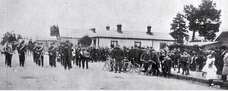 The anti-consumption crusade : Dr Greenwood and Mr Hornbrook at Rangiora : the Rangiora Brass Band shown leading the procession to Victoria Park. The anti-consumption crusade : Dr Greenwood and Mr Hornbrook at Rangiora : the Rangiora Brass Band shown leading the procession to Victoria Park.