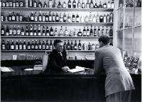 Serving a customer at Maling & Co. Ltd, 86 Gloucester Street 