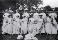 A group of St. Helen's nurses with their charges