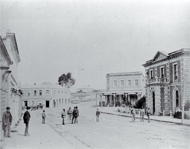 Great North Road (later Stafford Street) Timaru : BNZ building on right, in centre Club Hotel. Great North Road (later Stafford Street) Timaru : BNZ building on right, in centre Club Hotel.