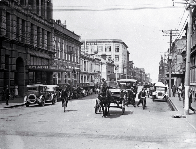 A horse and dray among the cars in Manchester Street, looking south towards the Clock Tower A horse and dray among the cars in Manchester Street, looking south towards the Clock Tower