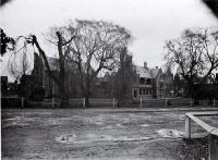 The stone chamber & Bellamy's of the old Provincial Government Buildings, across the Avon River from Oxford Terrace, Christchurch