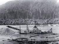 A gold dredge on the Buller River, West Coast