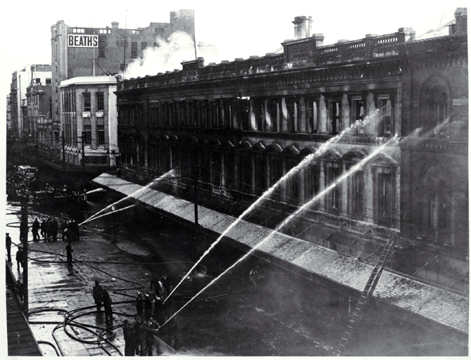 Firemen dampening down Ballantyne's building, Christchurch Firemen dampening down Ballantyne's building, Christchurch