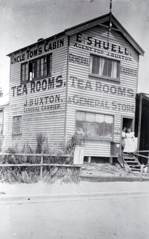 Uncle Tom's Cabin & Tearooms, North New Brighton, Christchurch : pictured on the step are two of the five proprietor/postmaster's family who ran the store. Uncle Tom's Cabin & Tearooms, North New Brighton, Christchurch : pictured on the step are two of the five proprietor/postmaster's family who ran the store.