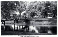Woodland bridge in Christchurch Botanic Gardens : on the right is the Bandsmens Memorial rotunda.