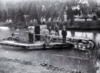 Richard Bedward Owen, pictured second from left on R.T. Stewart's river sweeper
