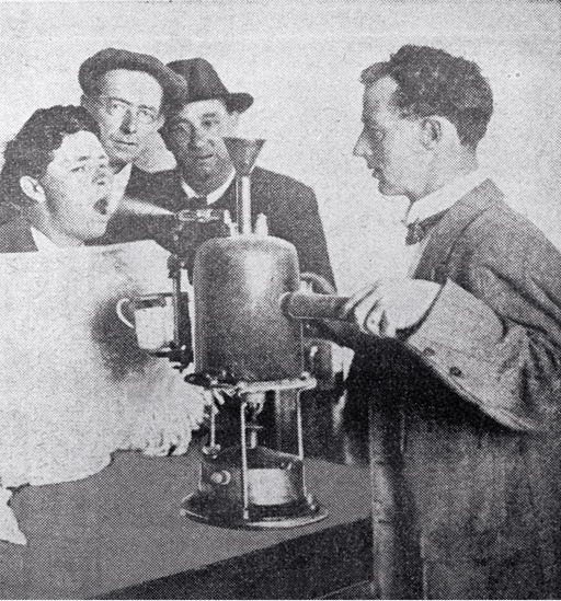 In an attempt to arrest the spread of infection during the influenza epidemic, people attended public inhalation chambers to have their throats sprayed In an attempt to arrest the spread of infection during the influenza epidemic, people attended public inhalation chambers to have their throats sprayed