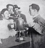 In an attempt to arrest the spread of infection during the influenza epidemic, people attended public inhalation chambers to have their throats sprayed 