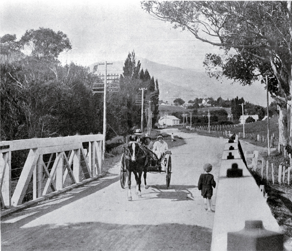 Horse and buggy crossing the bridge : looking up towards the Wairewa Valley from Little River, Banks Peninsula. Horse and buggy crossing the bridge : looking up towards the Wairewa Valley from Little River, Banks Peninsula.