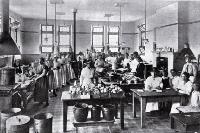 The soup kitchen at the Sydenham Manual Training Centre some workers under Miss Ponder.