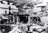The Lyttelton portal of the Lyttelton Rail Tunnel with construction workers - click for enlargement