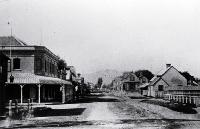 View down Colombo Street toward the Port Hills at right is Market (Victoria) Square and at left is the Crystal Palace, Christchurch