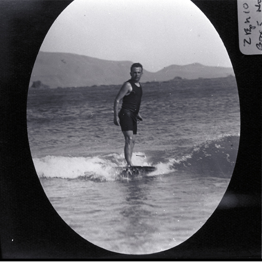 A man surfing, possibly at a Wellington beach A man surfing, possibly at a Wellington beach