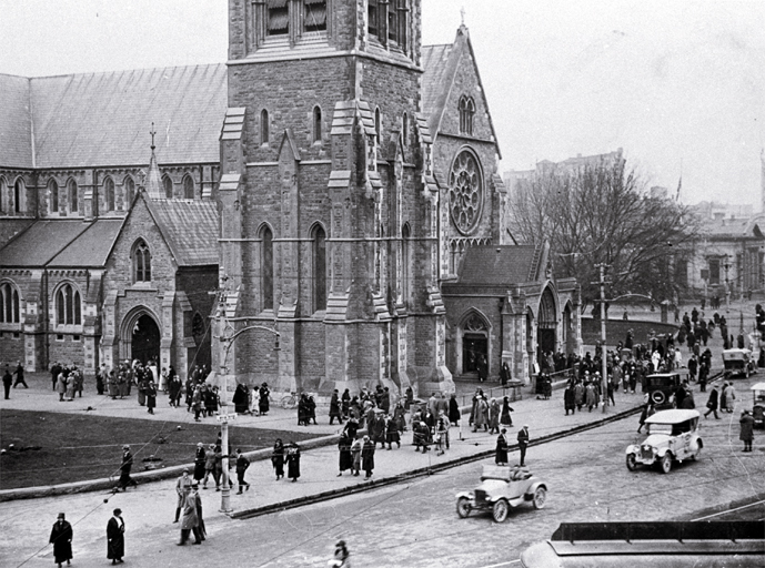 Church worshippers coming out of the Christchurch Cathedral after a service Church worshippers coming out of the Christchurch Cathedral after a service