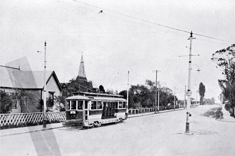 An electric tram on Harewood Road at the intersection with the Main North Road, looking up from Papanui An electric tram on Harewood Road at the intersection with the Main North Road, looking up from Papanui