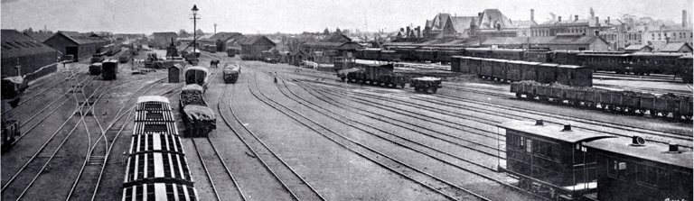 The railway yard and station, west of the Madras Street bridge The railway yard and station, west of the Madras Street bridge
