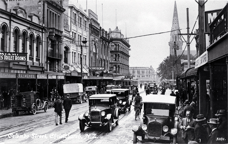 Cars, cyclists and pedestrians in Colombo Street, Christchurch : Cathedral Square is in the background. Cars, cyclists and pedestrians in Colombo Street, Christchurch : Cathedral Square is in the background.