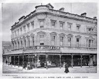 Shoppers strolling by Waterloo House, corner of Cashel and Colombo Streets, Christchurch, 1898