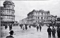 Easter Monday in Cathedral Square, Christchurch : to the left is the Royal Exchange Building, to right the AMP Society building.