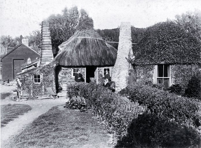 The Shand homestead at Te Whakaru : Mrs Shand seated in front of house with two daughters, Jennie and Susan. The Shand homestead at Te Whakaru : Mrs Shand seated in front of house with two daughters, Jennie and Susan.
