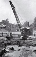 A mechanical digger at work in Opawa, Christchurch