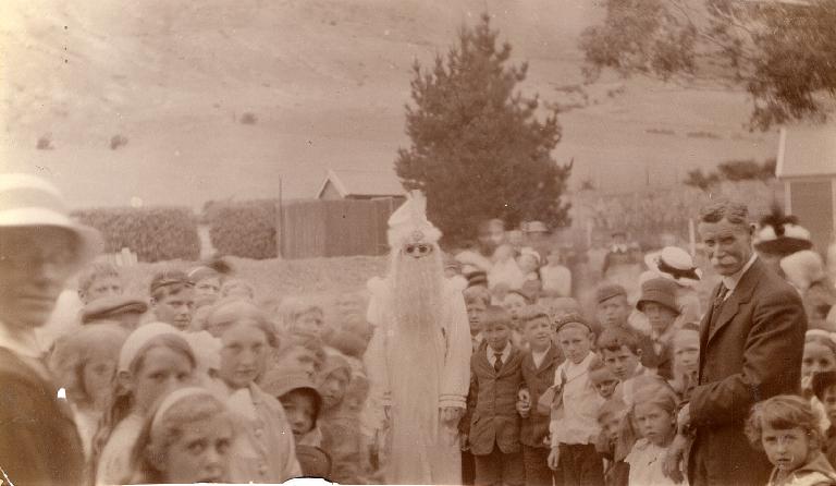 Father Christmas (Mr. McMillan) at Heathcote School - Mrs. Yeale in foreground - Mr James Weir - Chairman School Committee - 1900 - 1910 Father Christmas (Mr. McMillan) at Heathcote School - Mrs. Yeale in foreground - Mr James Weir - Chairman School Committee - 1900 - 1910
