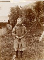 Dorothy Gimblett - August 1907 - at Mcdowell's (10 1/2) Bridle Path Road, Heathcote - note pet magpie.