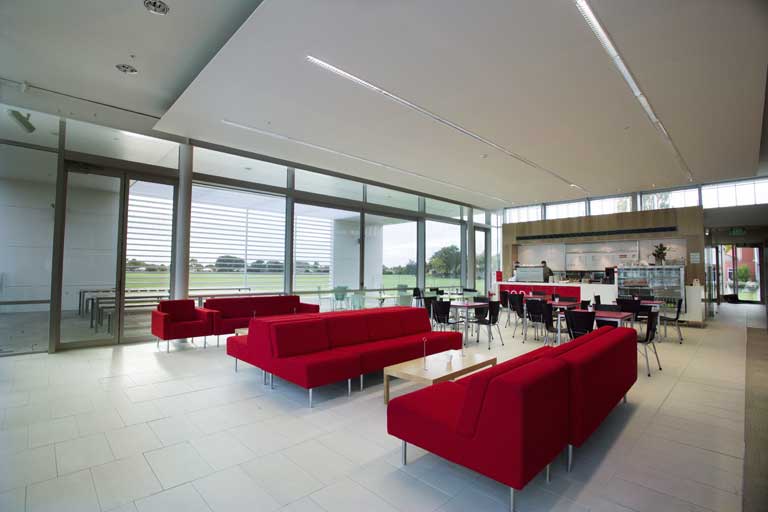 Lounge and café looking out to veranda and Riccarton High School grounds Lounge and café looking out to veranda and Riccarton High School grounds