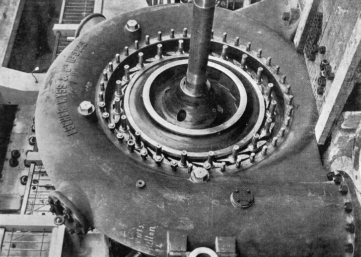 One of the main 2000 horse-power turbines, made by the famous Swiss engineers, Escher Wyss and Co. One of the main 2000 horse-power turbines, made by the famous Swiss engineers, Escher Wyss and Co.