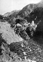 On the route of the Midland Railway: surveyors’ huts at the top of the Otira Gorge, West Coast Road.