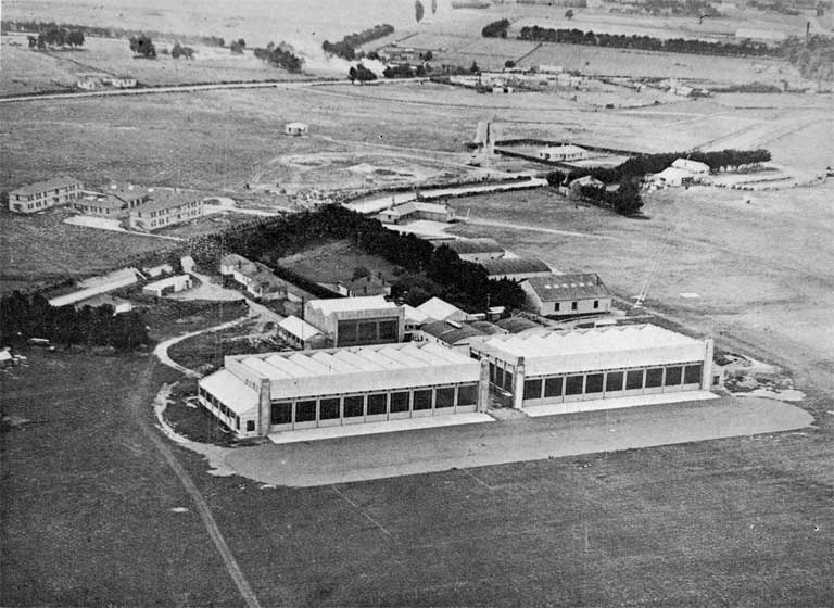 Aerial view showing the progress of the building at the RNZAF Flying Training School, Wigram aerodrome Aerial view showing the progress of the building at the RNZAF Flying Training School, Wigram aerodrome