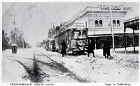 A tram runs into difficulties, at the corner of Colombo and Armagh Streets, when Christchurch was hit by snow
