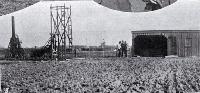 Shed and the well sinking plant at the new soldier's settlement near Avonhead, Christchurch