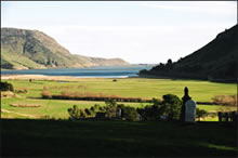 The view seaward of Te Roto o Wairewa from the urupā