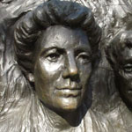 Photo of Kate on the Kate Sheppard Memorial