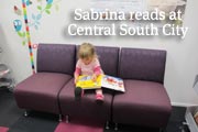 Sabrina reading at Central South City Library photo